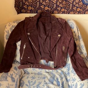 Leather soft flocked jacket, many little zippers and buttons as decoration